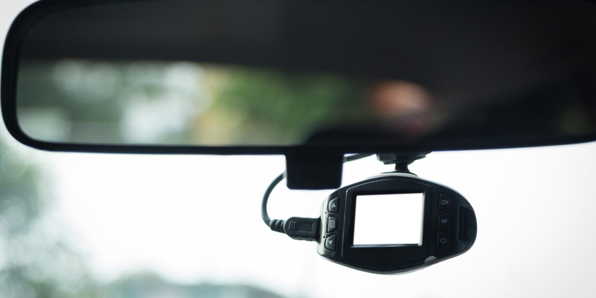 dashcam installed on rear view mirror