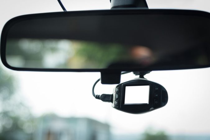 dashcam installed on rear view mirror