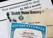 A Social Security card and a U.S. Treasury check are placed on top of a document showing a monthly payment amount of $1,765.