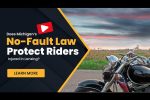 A motorcycle is parked by a rural road at sunset; a banner reads "Does Michigan’s No-Fault Law Protect Riders? Injured in Lansing? Learn More.